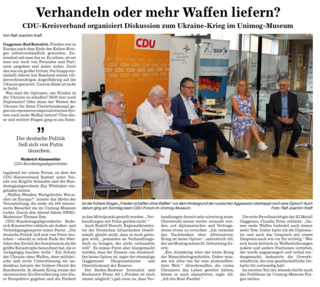 Podiumsdiskussion des CDU-Kreisverbands zum Ukraine-Krieg im Unimog-Museum mit vier Rednern vor CDU-Logos.
