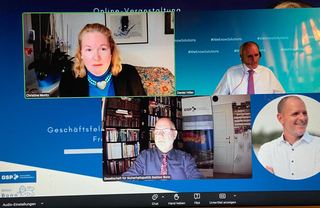 Screenshot einer Online-Veranstaltung mit vier Teilnehmern in Videofenstern, darunter Christina Moritz und Daniel Hiller.